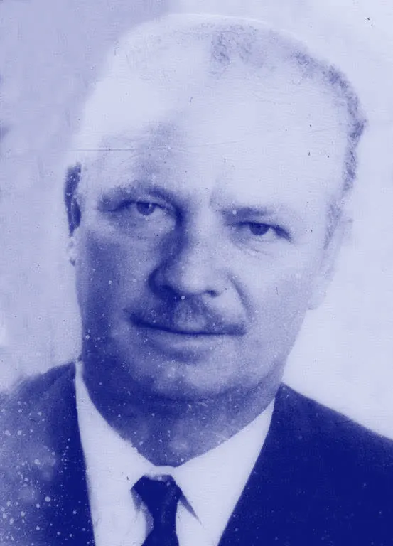 'n Ou portret van 'n man in 'n pak en das